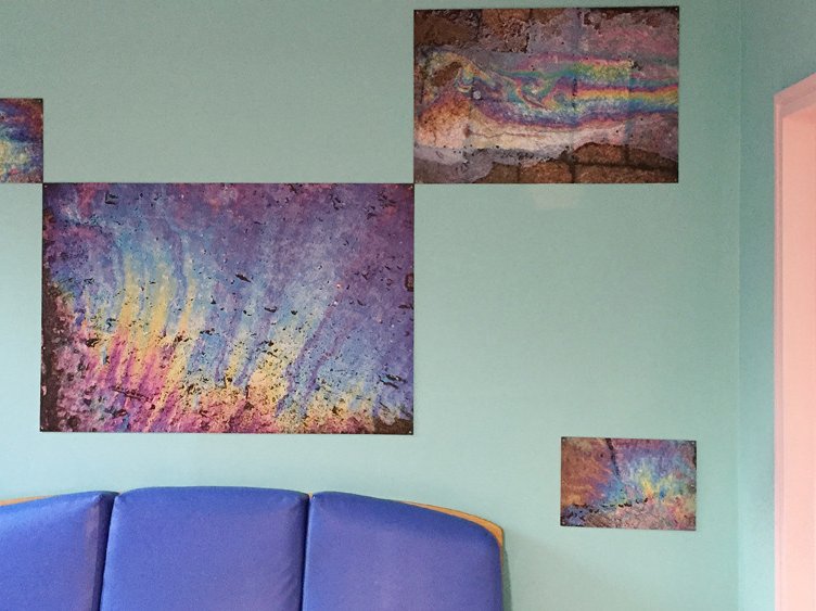 Photo of a waiting room with photographic art on the wall