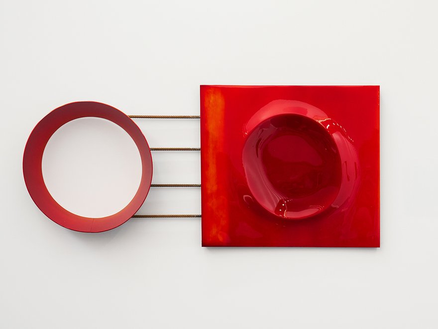 Modern sculptural work with layers of red luminous automotive paint on salvaged steel and aluminium
