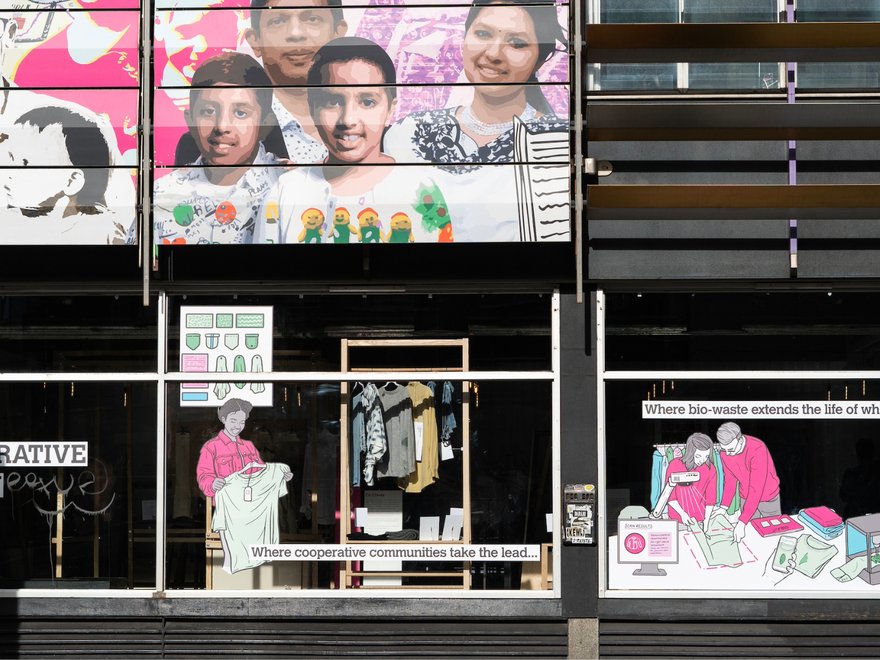 front of a building with banners